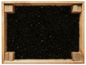 Blick in eine offene Kiste mit Loisachtaler Gartenhumus